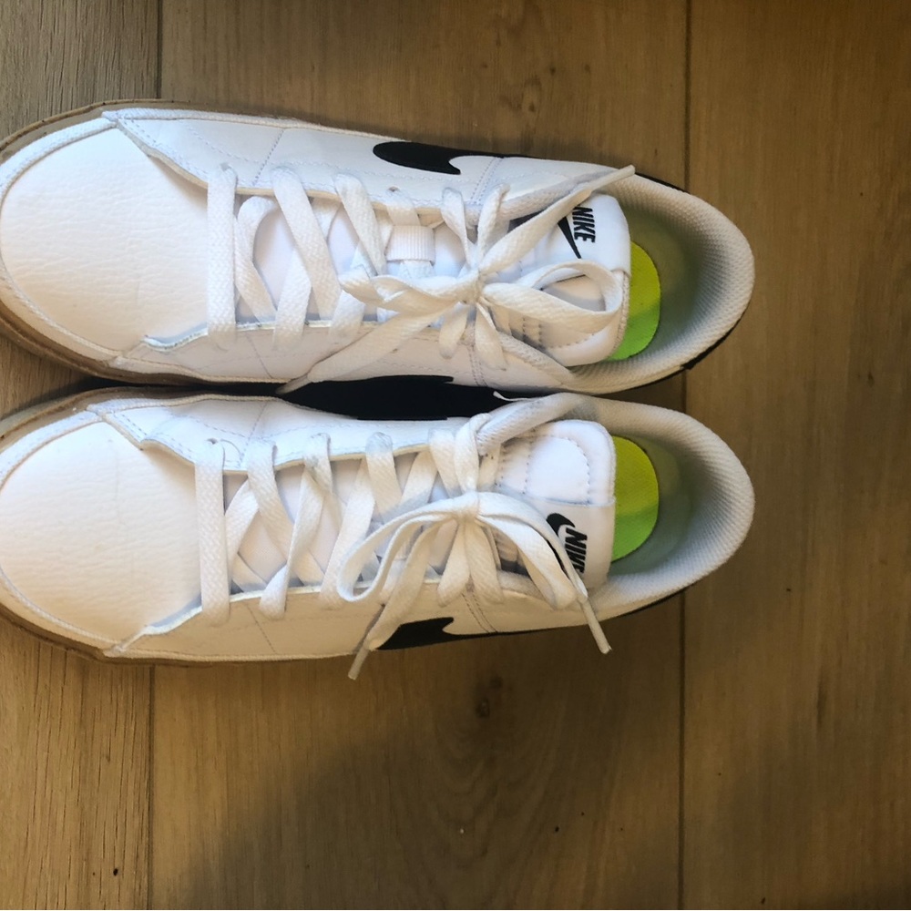 Nike White Sneakers with Black Swoosh